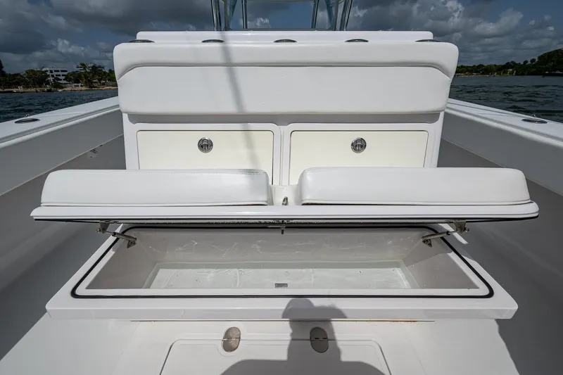 It's Time Yacht Photos Pics 2015 Bahama 41 boat storage compartment with open lid, showcasing spacious interior.