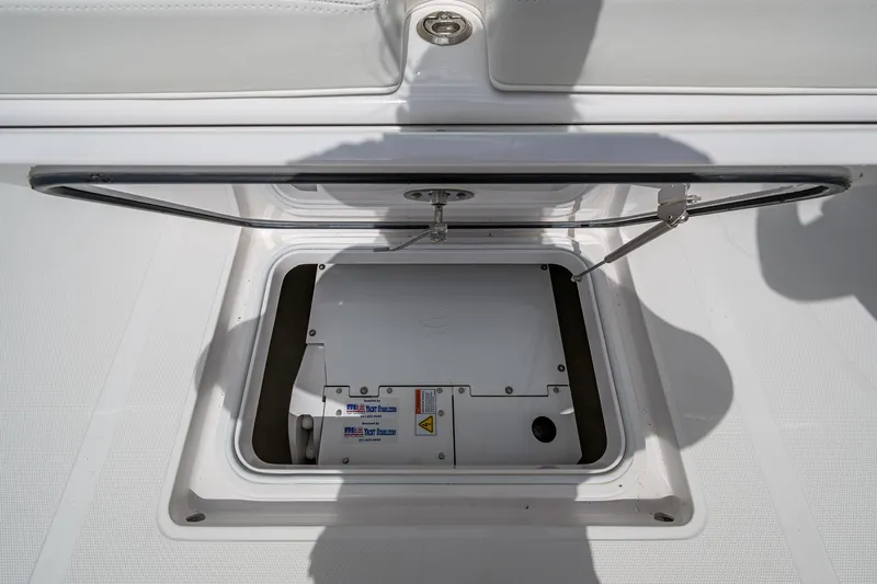 It's Time Yacht Photos Pics 2015 Bahama 41 boat hatch open, revealing storage compartment.