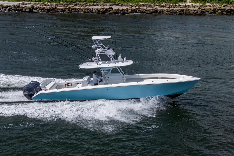 It's Time Yacht Photos Pics 2015 Bahama 41 boat cruising on water, featuring sleek design and powerful engines.