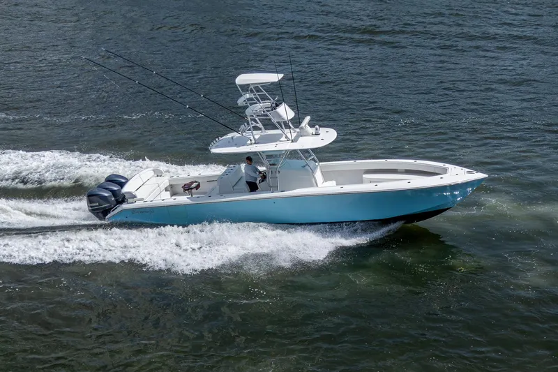 It's Time Yacht Photos Pics 2015 Bahama 41 boat cruising on water with dual outboard engines.