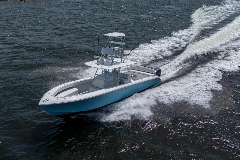 It's Time Yacht Photos Pics 2015 Bahama 41 boat cruising on open water, creating a dynamic wake.