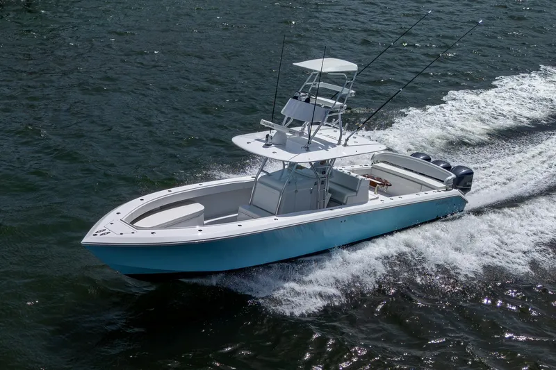 It's Time Yacht Photos Pics 2015 Bahama 41 boat cruising on water, featuring sleek design and powerful engines.