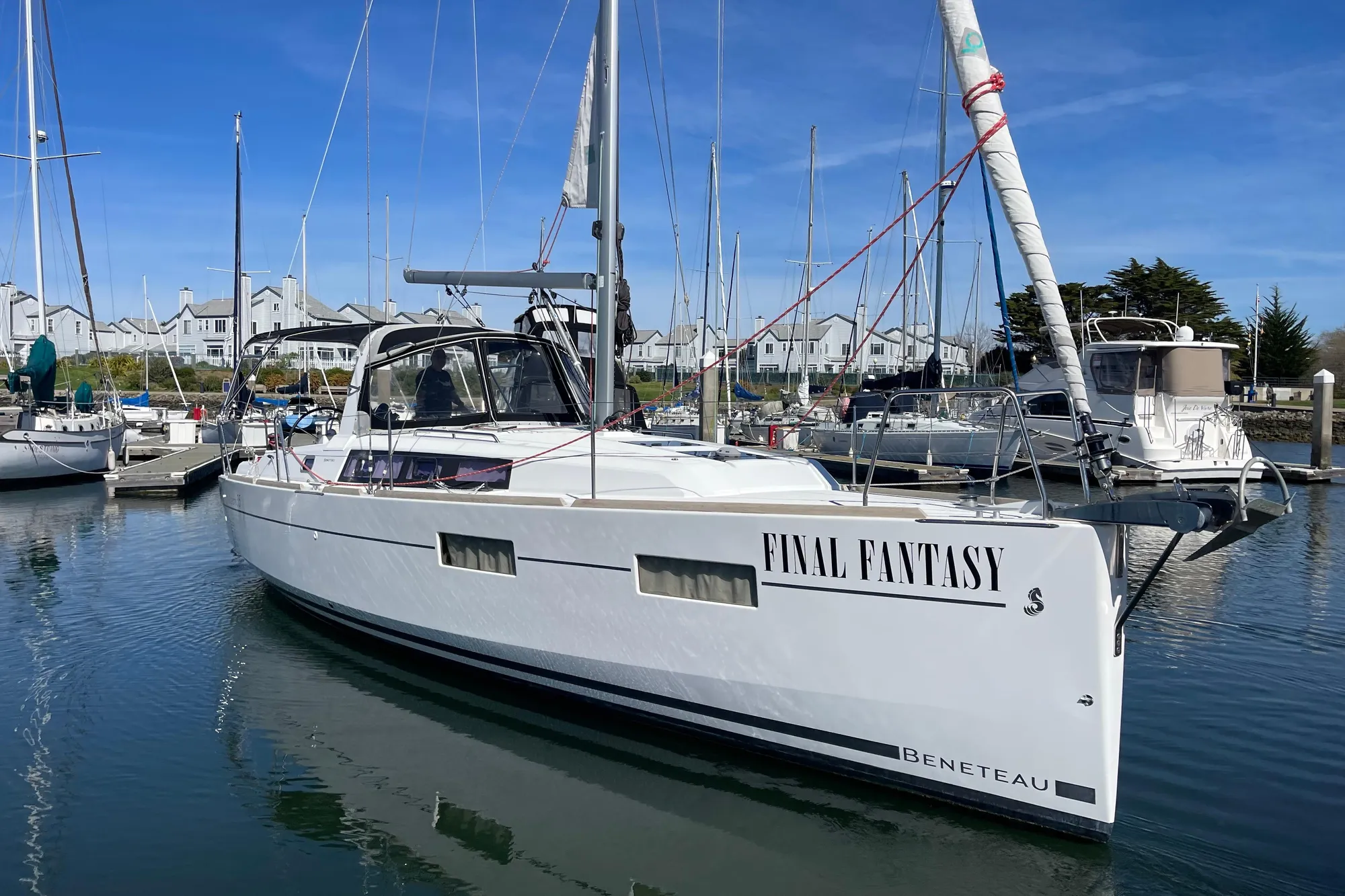 Beneteau First 235 sailboat named "Final Fantasy" docked in a marina, 2015 model.