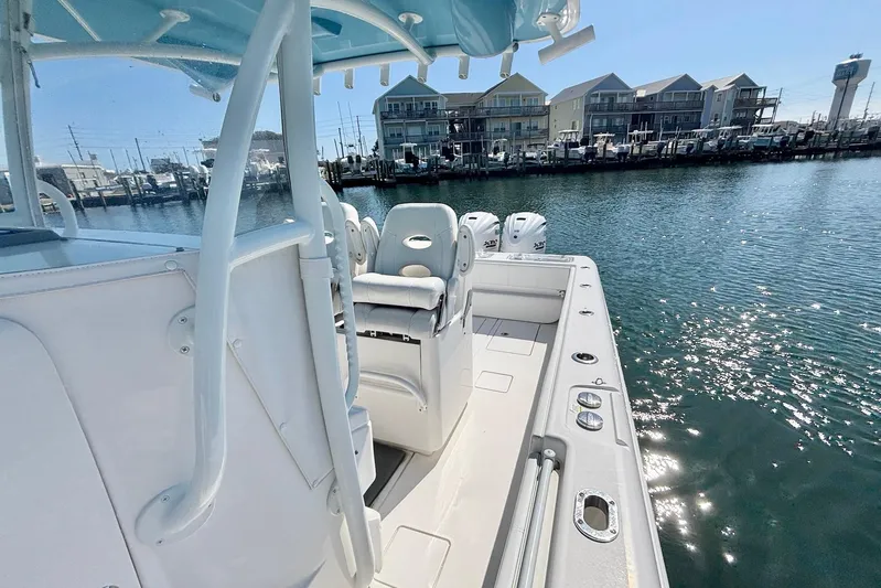  Yacht Photos Pics 2020 Contender 35 ST boat docked, showcasing sleek design and spacious deck.