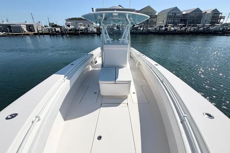  Yacht Photos Pics 2020 Contender 35 ST boat on water, showcasing sleek design and spacious deck.