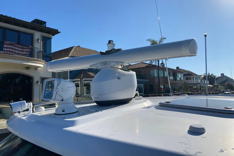  Yacht Photos Pics Rooftop radar and camera on 2021 Boston Whaler 345 Conquest boat, dockside view.
