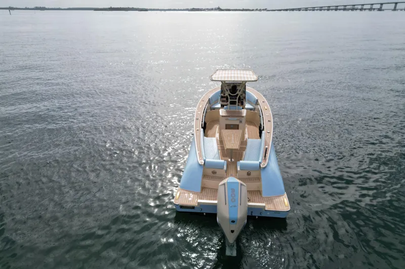  Yacht Photos Pics Lilybaeum Levanzo 25 Lounge Deck 2026 boat on calm water, aerial view.