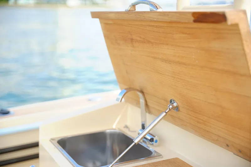  Yacht Photos Pics Lilybaeum Levanzo 25 Lounge Deck 2026 boat sink with wooden cover open.