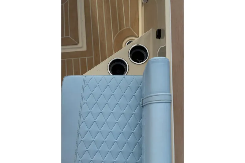  Yacht Photos Pics Luxurious blue seating on Lilybaeum Levanzo 25 Lounge Deck, 2026 model, with cup holders.