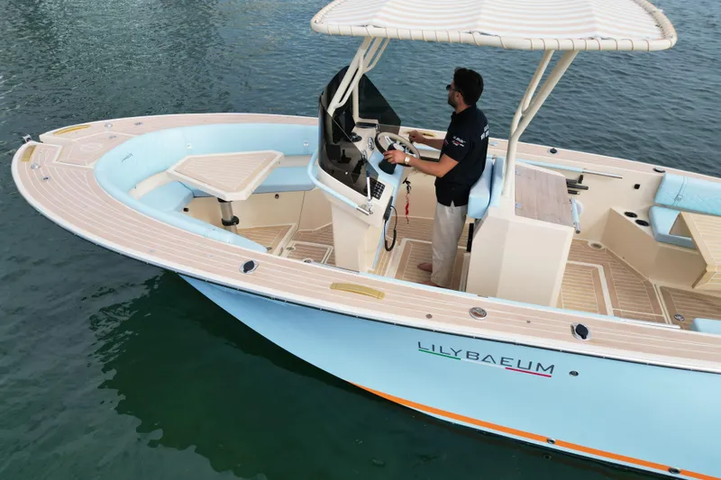  Yacht Photos Pics 2026 Lilybaeum Levanzo 25 Lounge Deck boat on water, featuring modern design and spacious deck.