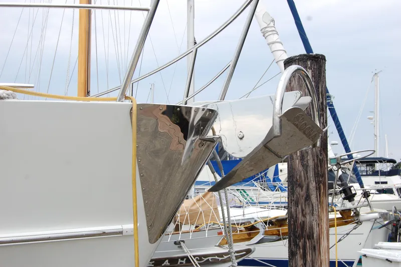 Wandering Bear Yacht Photos Pics Bow of 2001 Ocean Alexander Classico yacht with anchor at marina.