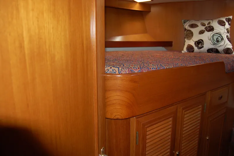 Wandering Bear Yacht Photos Pics Luxurious wooden cabin interior of 2001 Ocean Alexander Classico yacht.