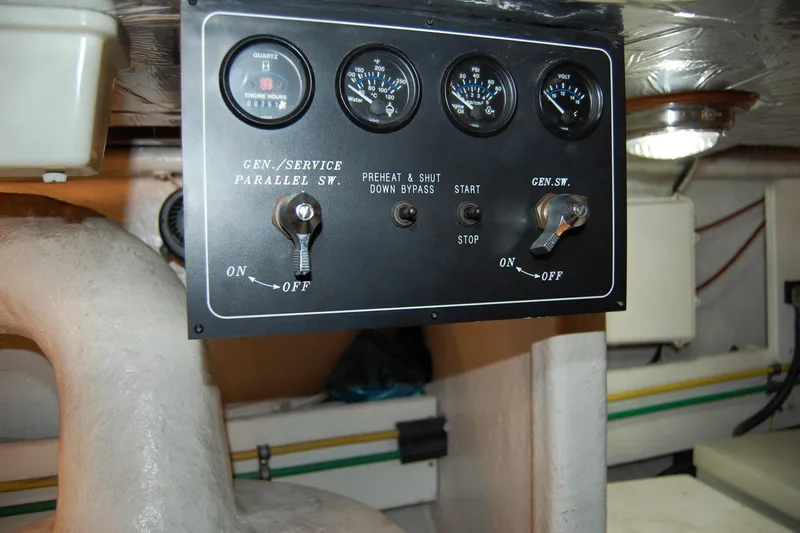 Wandering Bear Yacht Photos Pics Control panel of a 2001 Ocean Alexander Classico yacht engine room.