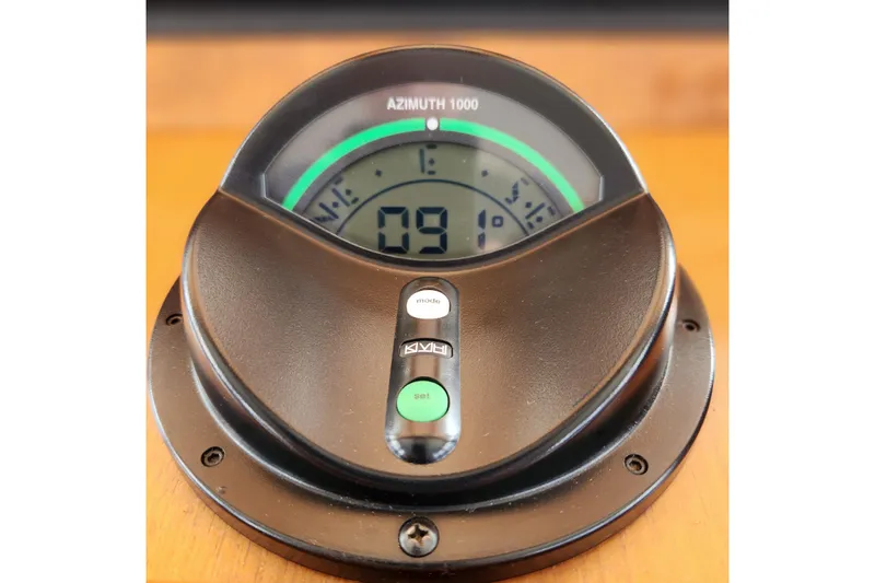 Wandering Bear Yacht Photos Pics Azimuth 1000 compass on 2001 Ocean Alexander Classico yacht dashboard.