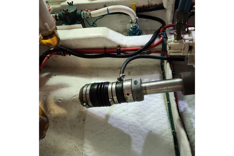 Wandering Bear Yacht Photos Pics Engine room of 2001 Ocean Alexander Classico yacht, showing mechanical components and wiring.