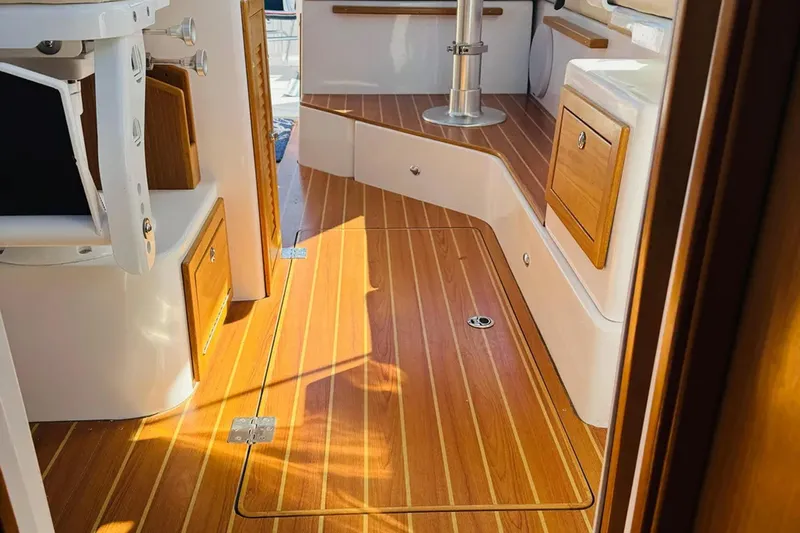 Forever Moor Yacht Photos Pics 2024 True North 34 Outboard Express interior with elegant wood finish and modern design.