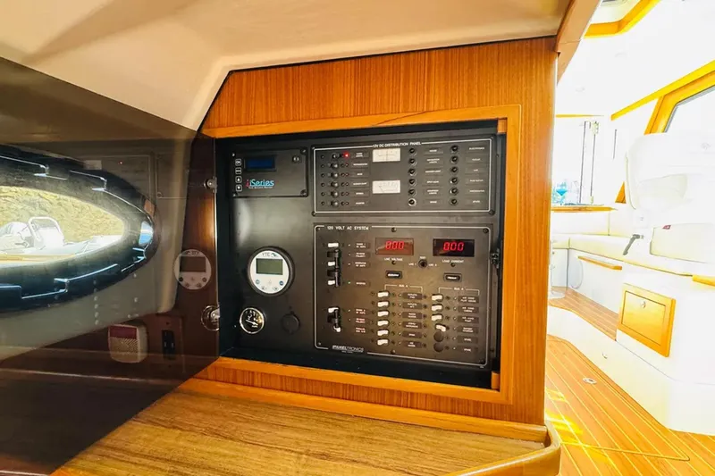 Forever Moor Yacht Photos Pics Electrical control panel on 2024 True North 34 Outboard Express boat interior.