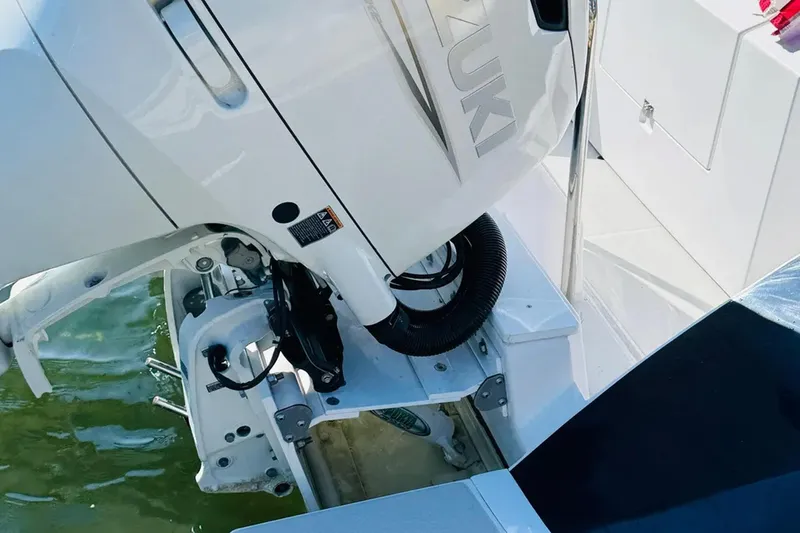 Forever Moor Yacht Photos Pics 2024 True North 34 Outboard Express boat engine detail, featuring Suzuki motor.