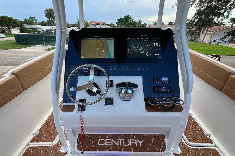  Yacht Photos Pics 2019 Century 3200 Center Console boat dashboard with navigation and control systems.