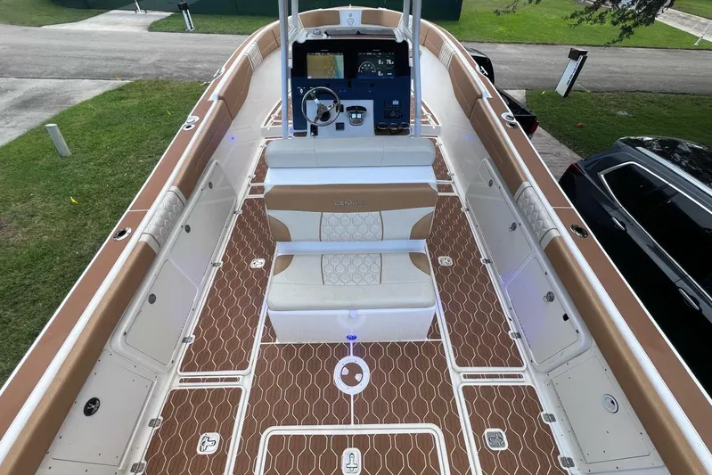  Yacht Photos Pics 2019 Century 3200 Center Console boat with spacious deck and modern controls.