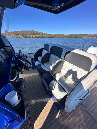  Yacht Photos Pics 2015 Nor-Tech 340 Sport Center Console boat interior with luxurious seating on a sunny day.