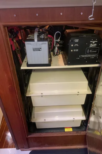  Yacht Photos Pics Electrical compartment of 1998 Hunter Passage 42 sailboat with battery and inverter.