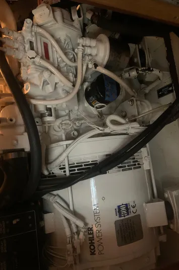  Yacht Photos Pics Engine compartment of 1998 Hunter Passage 42 with Kohler power system.