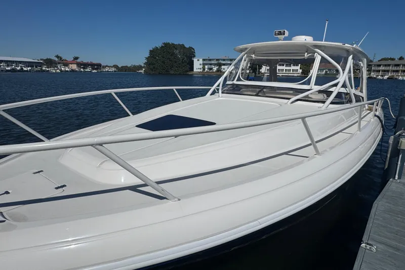  Yacht Photos Pics 2012 Intrepid 390 Sport Yacht docked on a sunny day.