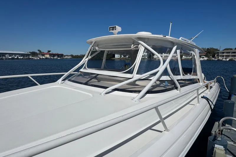  Yacht Photos Pics 2012 Intrepid 390 Sport Yacht docked on a sunny day.