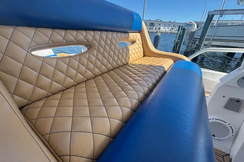  Yacht Photos Pics Luxurious seating on a 2012 Intrepid 390 Sport Yacht with quilted upholstery.