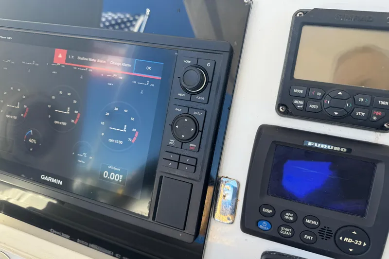  Yacht Photos Pics Control panel of a 2012 Intrepid 390 Sport Yacht with Garmin and Furuno displays.
