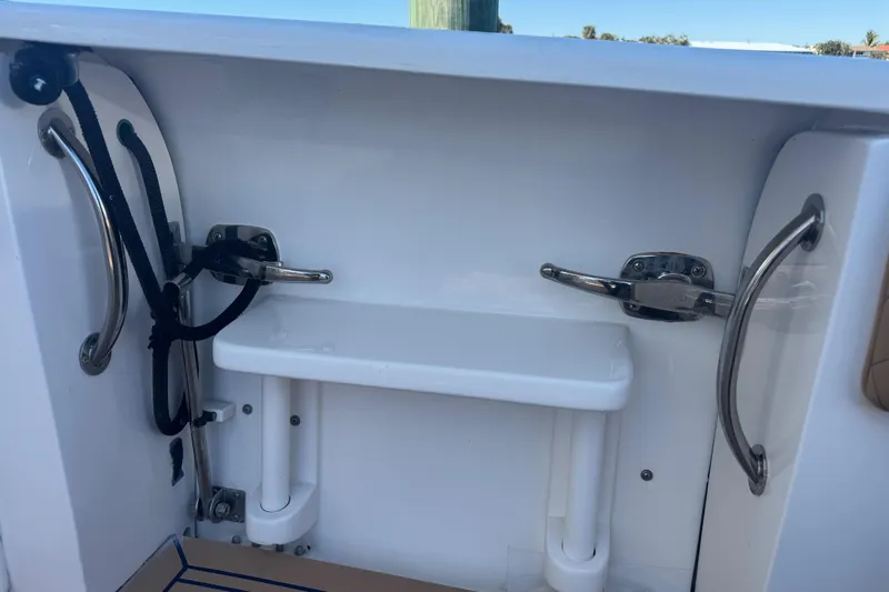  Yacht Photos Pics 2012 Intrepid 390 Sport Yacht interior with stainless steel fixtures and rope details.