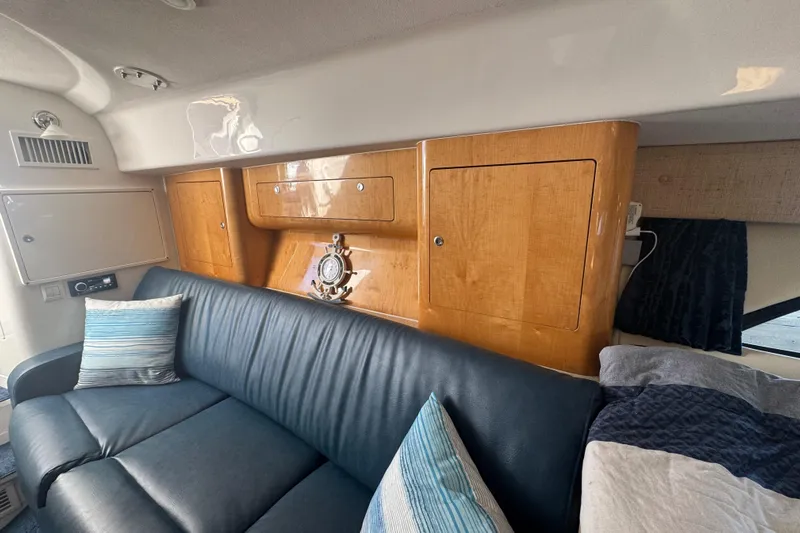  Yacht Photos Pics Interior of 2012 Intrepid 390 Sport Yacht with leather seating and wooden cabinetry.