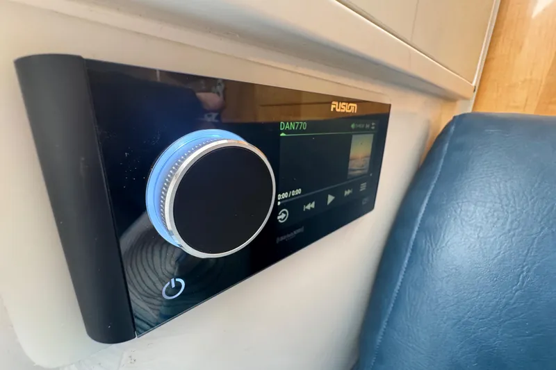  Yacht Photos Pics Fusion stereo system in a 2012 Intrepid 390 Sport Yacht, featuring a sleek control panel.