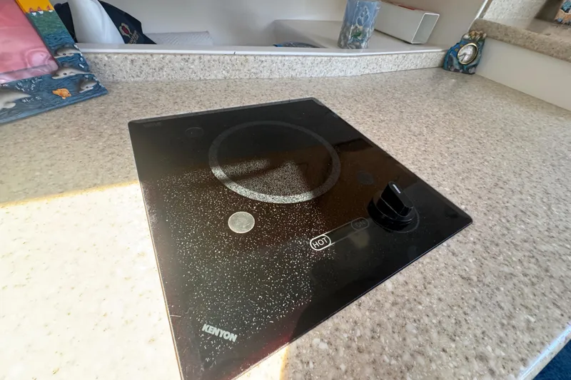  Yacht Photos Pics Kenyon cooktop on Intrepid 390 Sport Yacht 2012, set in a sleek countertop.