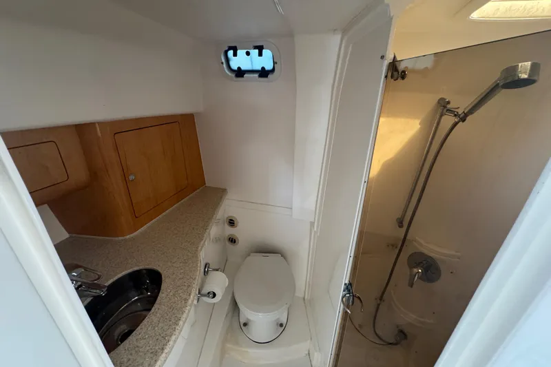  Yacht Photos Pics Bathroom of 2012 Intrepid 390 Sport Yacht with shower, sink, and toilet.