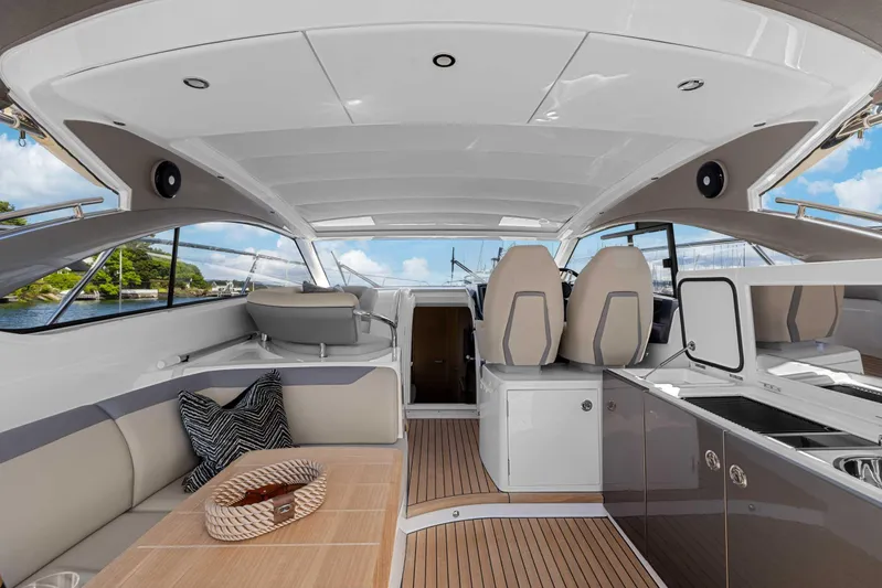V40188 Yacht Photos Pics Luxurious interior of 2024 Princess V40 yacht with elegant seating and modern amenities.