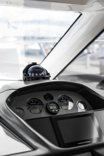 V40188 Yacht Photos Pics 2024 Princess V40 yacht dashboard with navigation instruments and Volvo Penta display.