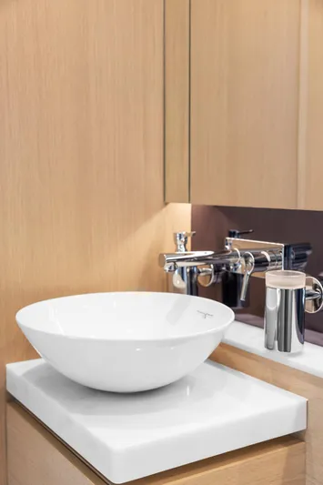 V40188 Yacht Photos Pics Modern bathroom sink with sleek faucet in 2024 Princess V40 yacht.