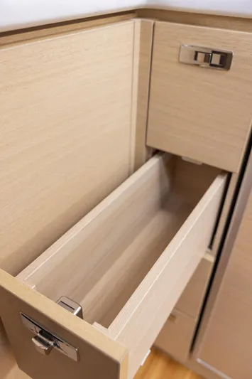 V40188 Yacht Photos Pics Open wooden drawer with metal handle in 2024 Princess V40 model interior.