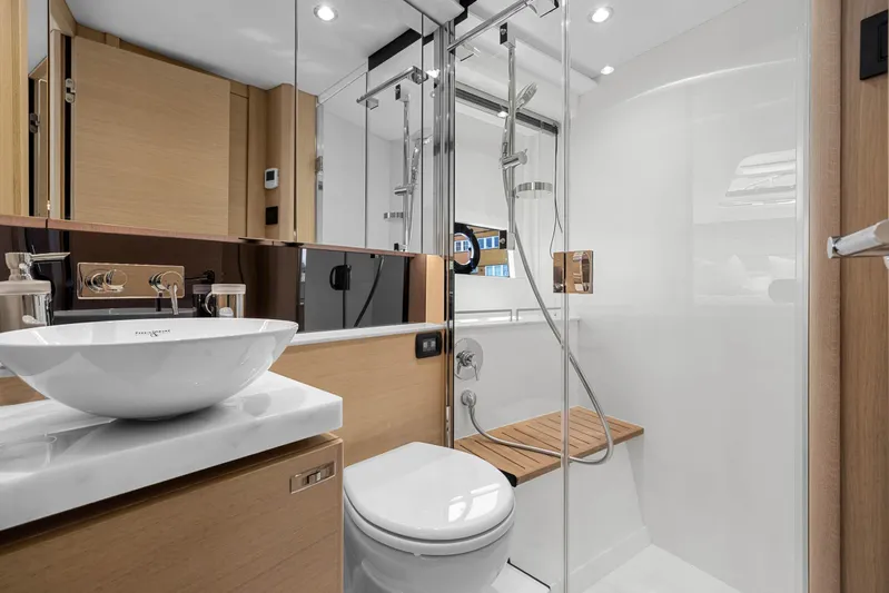 V40188 Yacht Photos Pics Luxurious bathroom in 2024 Princess V40 yacht with modern fixtures and elegant design.