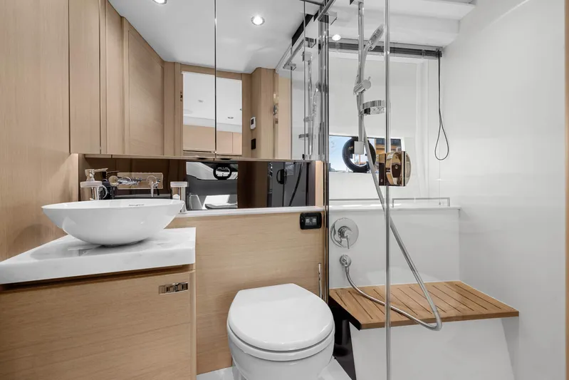 V40188 Yacht Photos Pics Luxurious bathroom in 2024 Princess V40 yacht with modern fixtures and wooden accents.