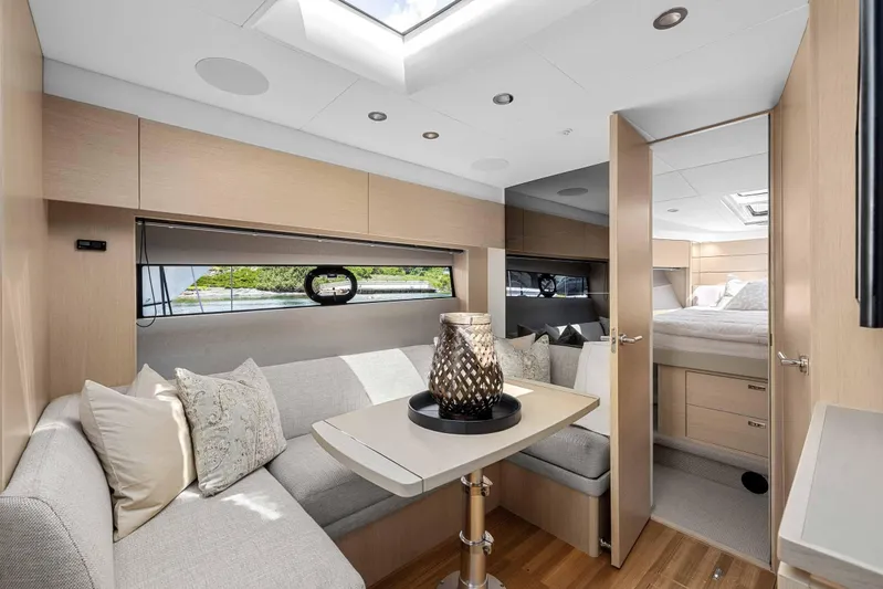 V40188 Yacht Photos Pics Luxurious interior of 2024 Princess V40 yacht with elegant seating and modern decor.
