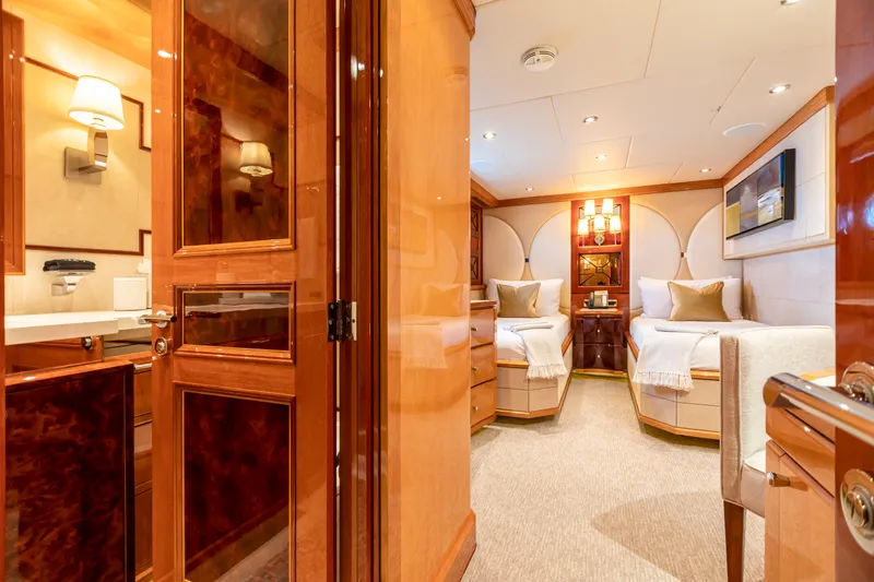 Impromptu Yacht Photos Pics Luxurious 2011 Trinity Yachts CUSTOM interior with twin beds and elegant wooden finishes.
