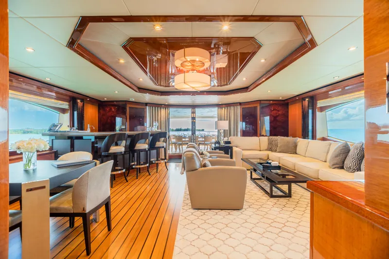 Impromptu Yacht Photos Pics Luxurious interior of 2011 Trinity Yachts CUSTOM model with elegant seating and dining areas.