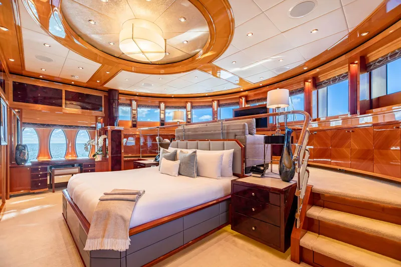 Impromptu Yacht Photos Pics Luxurious master bedroom on 2011 Trinity Yachts CUSTOM yacht with elegant wood finishes.