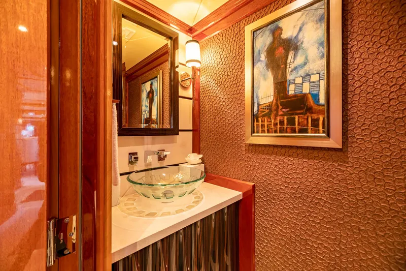 Impromptu Yacht Photos Pics Luxurious bathroom on 2011 Trinity Yachts CUSTOM with glass sink and modern artwork.