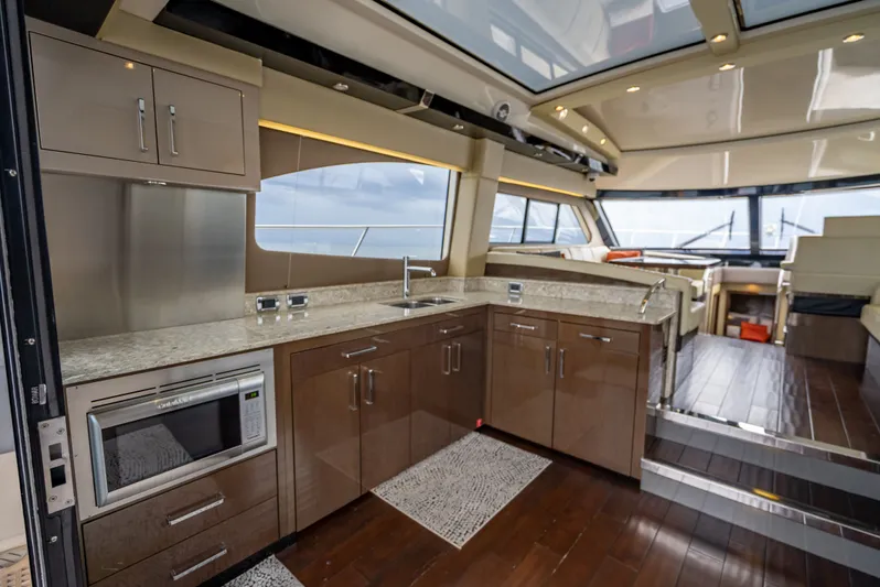 Pier Pressure Yacht Photos Pics Interior of Carver C52 Coupe yacht, modern kitchen, 2017 model.