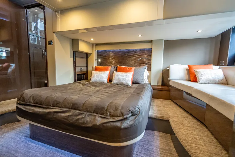 Pier Pressure Yacht Photos Pics Luxurious bedroom in Carver C52 Coupe 2017 yacht interior.