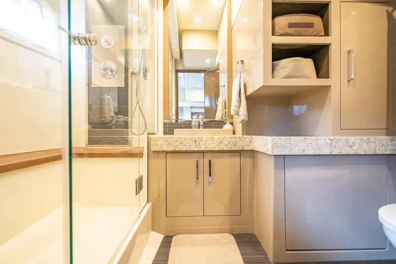 Pier Pressure Yacht Photos Pics Luxurious bathroom in Carver C52 Coupe 2017 yacht.